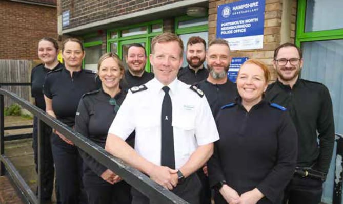 Hampshire and Isle of Wight Constabulary chief constable Scott Chilton (white shirt), February 2023.