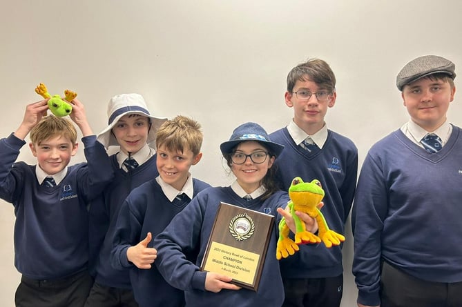 Farnham Heath End School's team with their trophy having beaten Eton College on their way to the International History Bowl and Bee titles