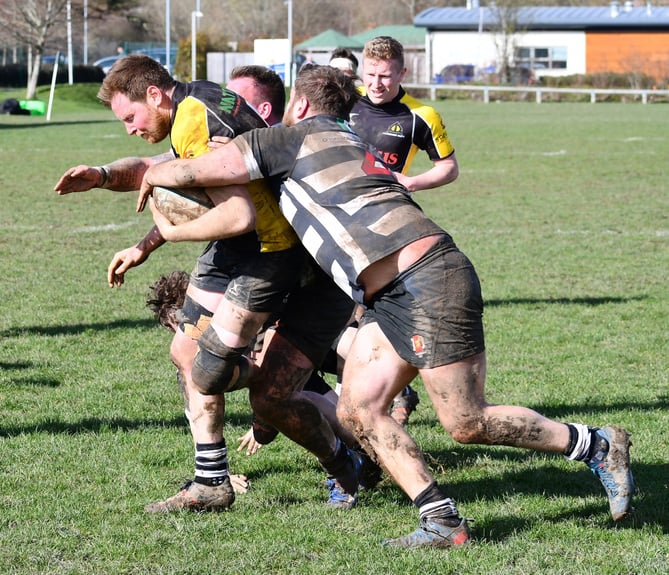 Ben Adams charges to the try line despite the attentions of the Gravesend heavies