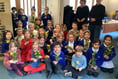 Children at All Saints CE Infant School in Tilford make posies for mum