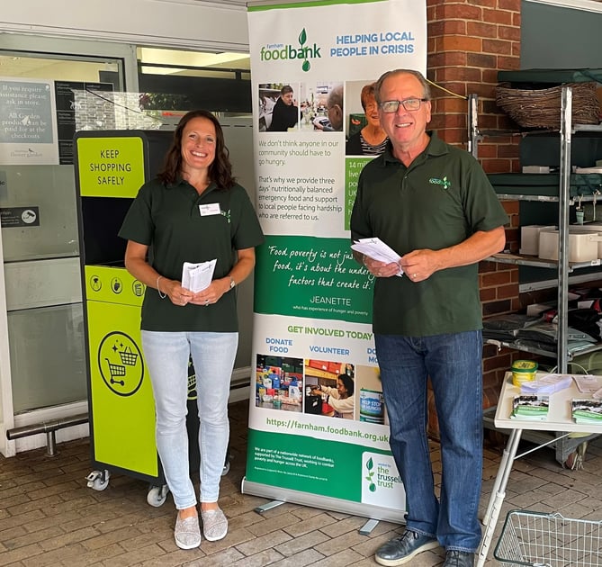 Farnham Foodbank volunteers Annette and Steve at a previous collection outside Waitrose in Lion & Lamb Yard
