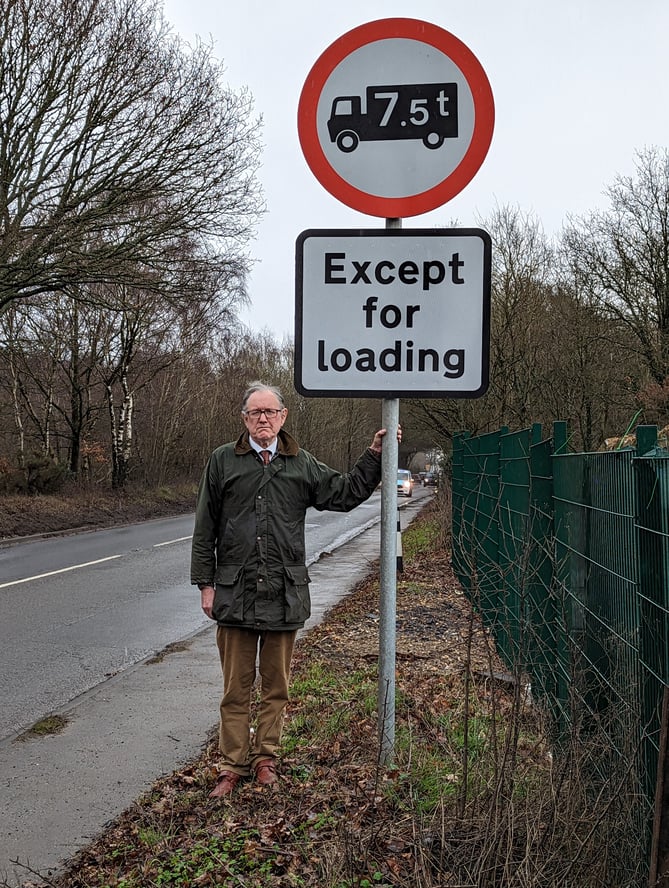 Andrew Jones with the 'unenforced' lorry ban sign