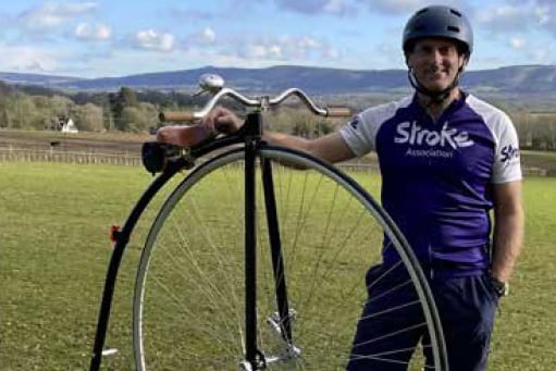 Tom Clowes with his penny farthing, April 2023.