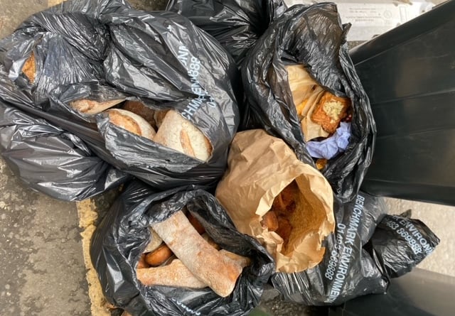 Debbie Flowerday counted eight black bin-liners full of bread and pastries outside of Gail's Bakery in Farnham