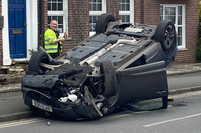 The driver of a black Peugeot 2008 was lucky to survive the crash without major injury after hitting the front of Maritime House and flipping over on Thursday, April 27