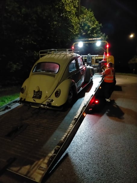Assheton Le Page's classic 1961 VW Beetle is loaded onto a recovery truck at 2am