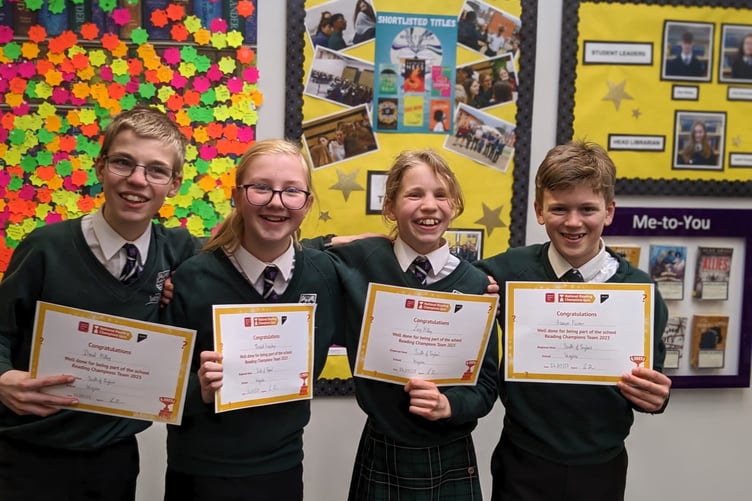 Daniel Kitley, left, Elizabeth Humphreys, Lucy Kitley and Harrison Parsons finished third in their heat