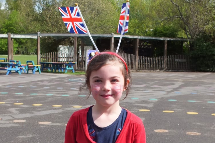 Bordon Infant School pupil in red, white and blue for coronation, May 5th 2023.