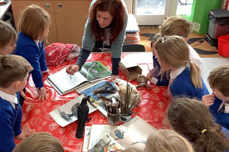 Red cube gallery curator Fi Scimone leads a St Mary’s Infant School art club session