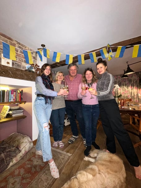 Khrystyna Kovalevska and her sponsor family celebrate the deoccupation of the Ukrainian city Kherson