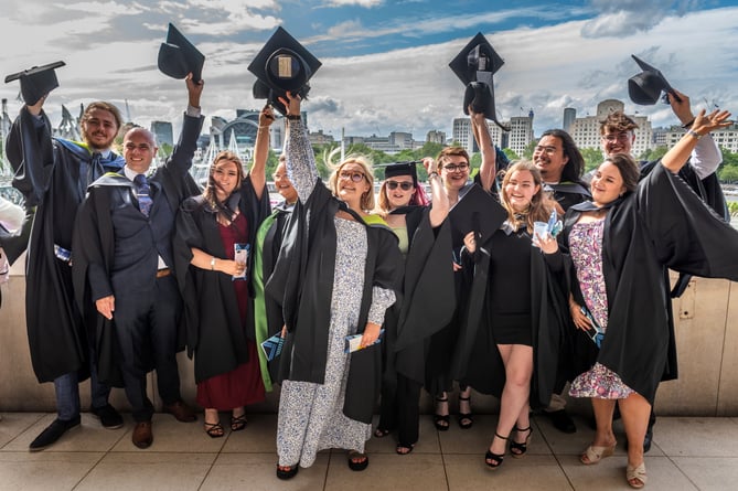 UCA students throw up their mortarboards after the impressive London graduation ceremony
