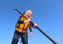 Six-year-old charity fundraising ace Dexter smashes 15-mile paddleboard challenge