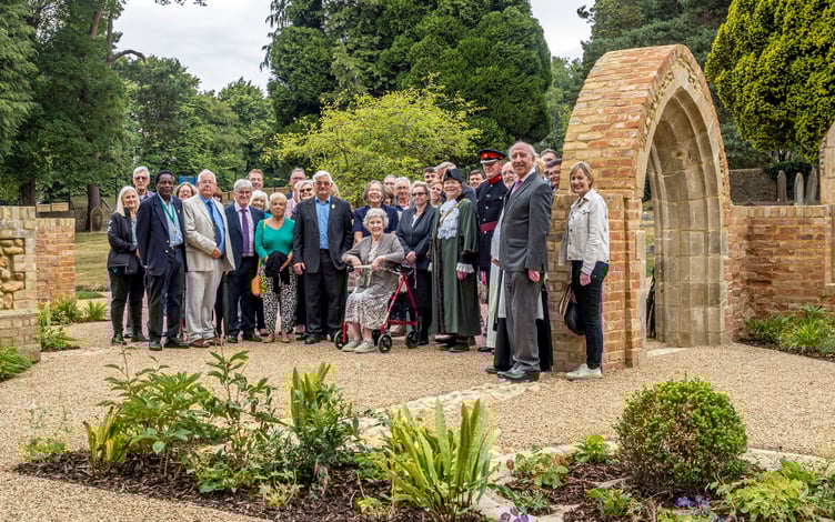 Deputy Lieutenant Bill Biddell and the mayor with guests at the new Hale Chapels Garden
