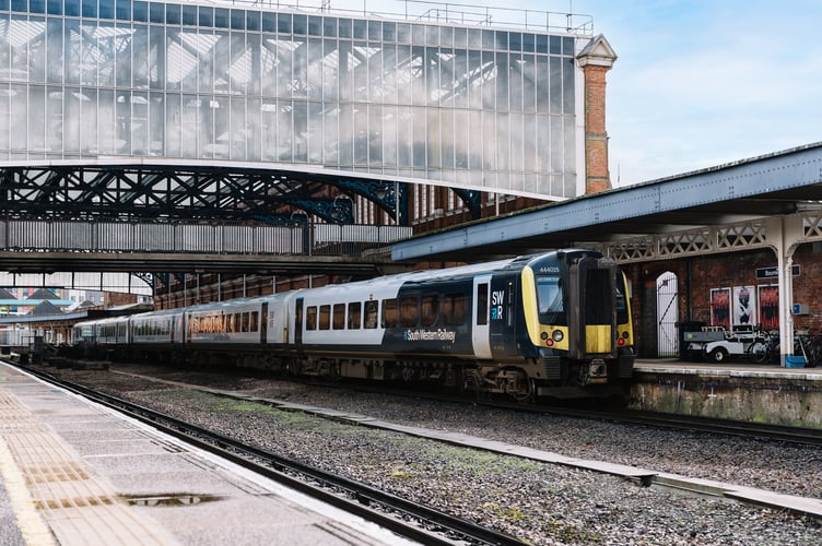 A SWR train departs Waterloo station