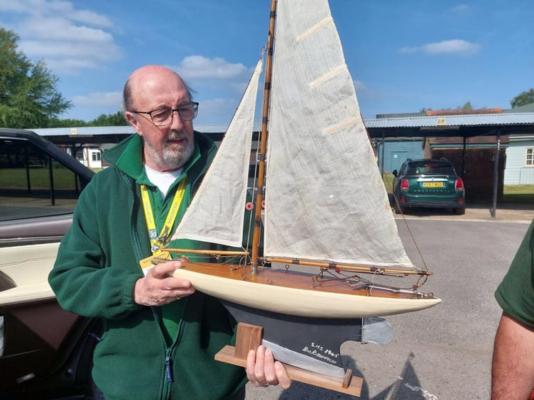 The German POW-built model yacht with its repairer, a contact of Farnham Repair Cafe