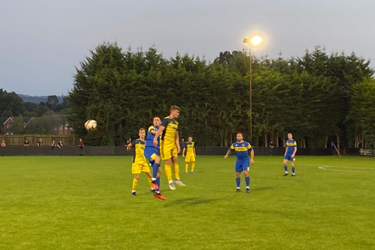 Action from Petersfield Town's 4-2 defeat against Moneyfields