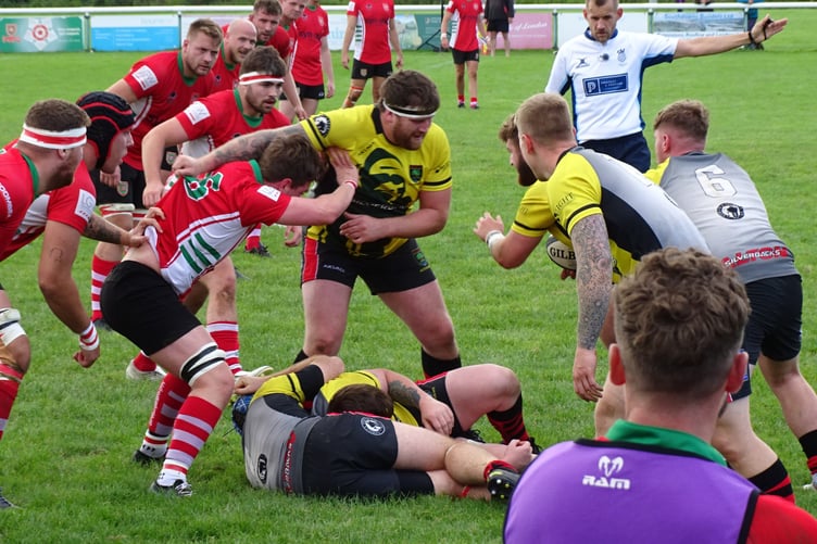 Alton attack while Jake Bosher – one of seven Petersfield forwards defending – holds off the visitors