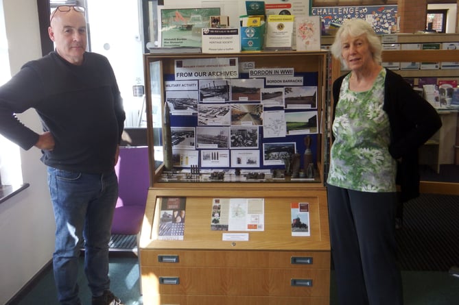 Chris Abraham (left) and Chris Wain with the Woolmer Forest Heritage Society display at Bordon Library