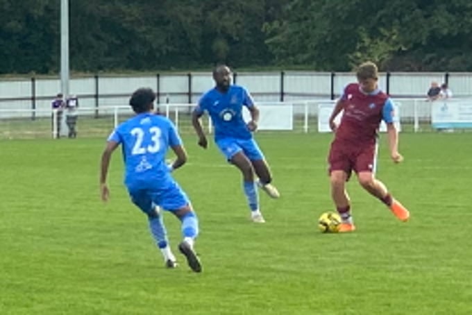 Action from Badshot Lea's FA Trophy match against Redbridge