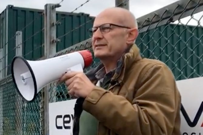 Colin Shearn addressing a 2021 protest at Farnborough Airport