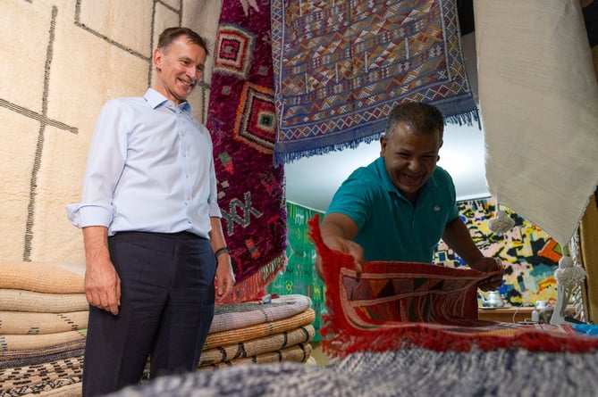 Buying a rug in the Medina after attending the IMF meetings in Marrakesh