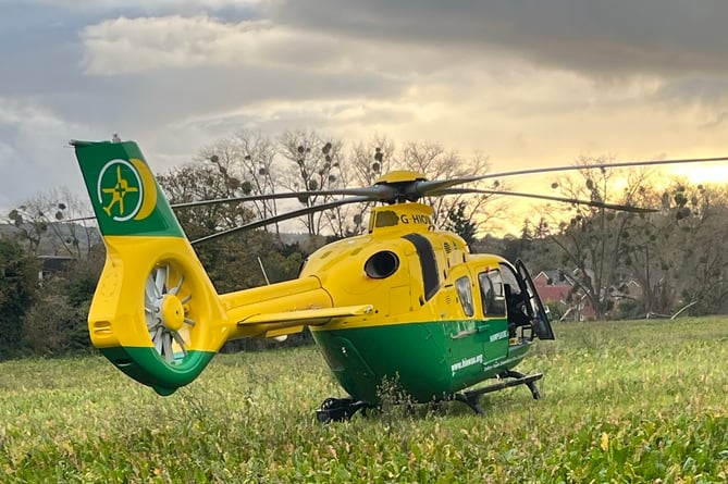 Dog walker Paul Grindley took this photo of the air ambulance after it landed on fields to the rear of the University for the Creative Arts in Farnham