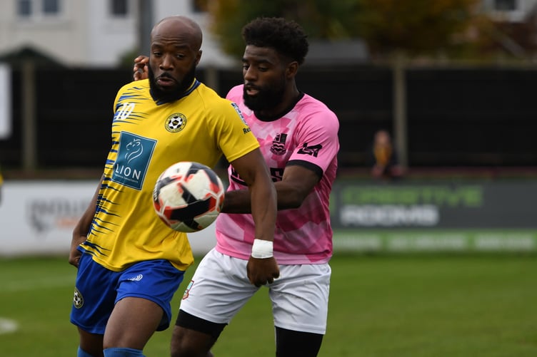 Lamar Koroma battles for possession against Snodland Town
