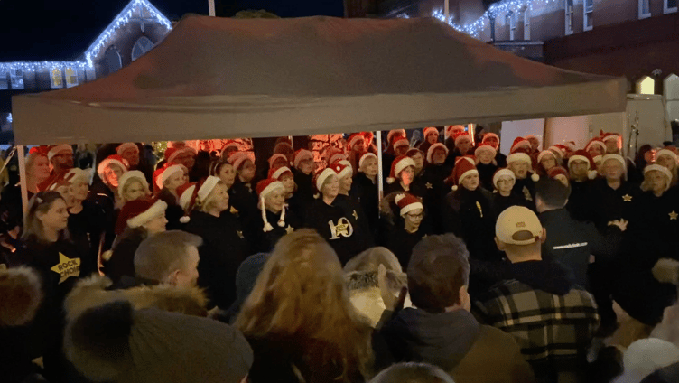 Alton Rock Choir entertain the crowd at the Alton Christmas lights switch-on