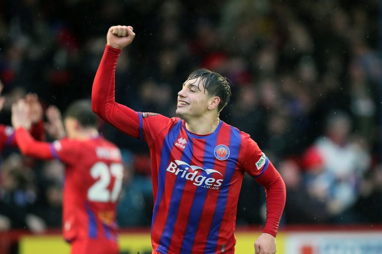 Josh Stokes celebrates his second goal against Stockport County