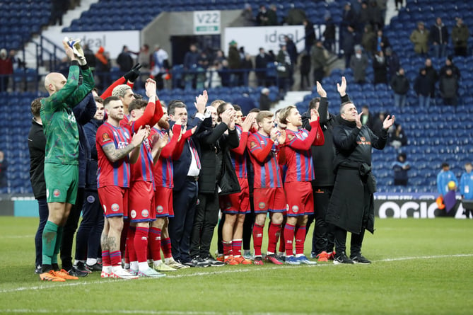 Aldershot Town's players and management thank the fans