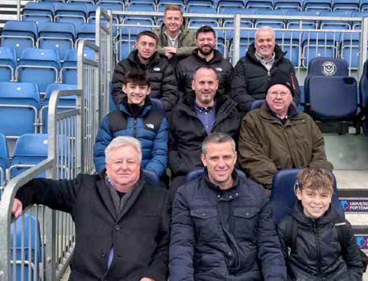 Gary Magee (bottom row, centre, next to his dad and son) with his fellow matchday sponsors, Portsmouth v Leyton Orient, January 13th 2024.