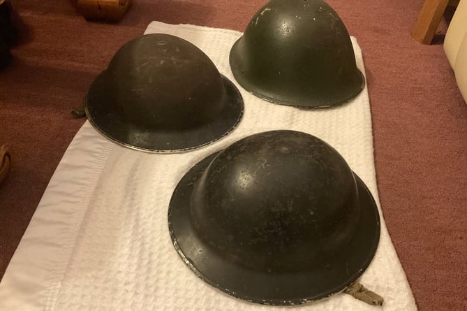 These three Second World War-era helmets were discovered at Farnham Station prior to the opening of the Spice Station Indian takeaway in around 1999