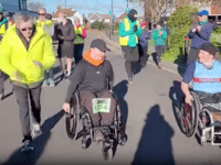 Farnham teen completes 10km in a wheelchair alongside Paralympian hero
