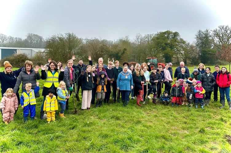 Volunteers gather for a successful day of tree planting.