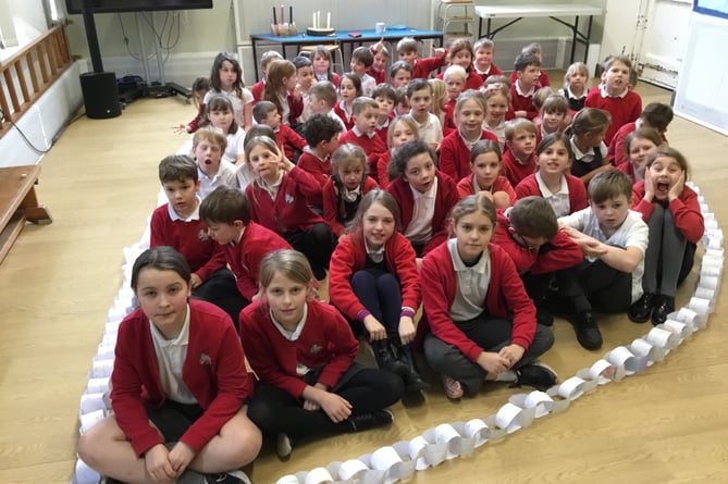 Binsted students celebrate leap year with acts of kindness paper chain.