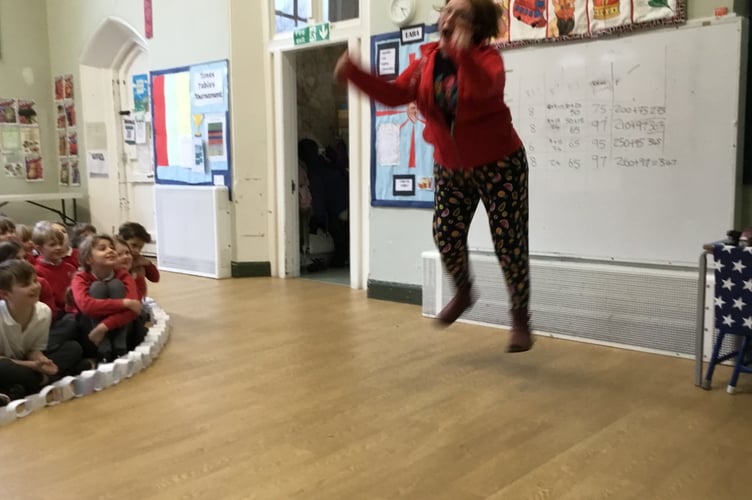 Staff member leaps for kindness to celebrate the Leap year.