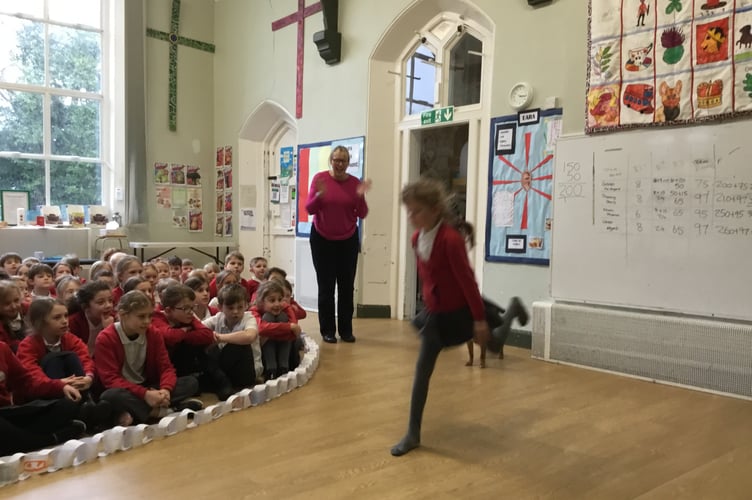 Student leaps for kindness to celebrate the Leap year.