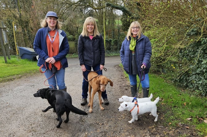 Rose Rawles with friends and her Parsons Russell terriers Patch and Ralph.
