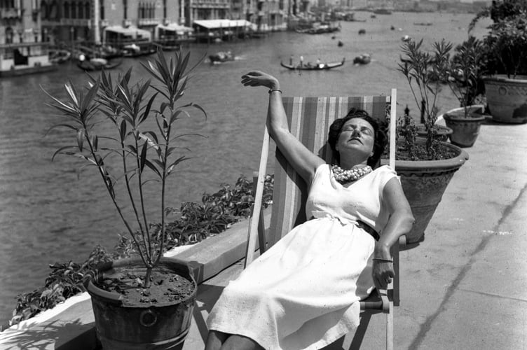Peggy Guggenheim on the roof terrace of Palazzo Venier dei Leoni in Venice, early 1950s (Photo: Archivio Cameraphoto Epoche)
