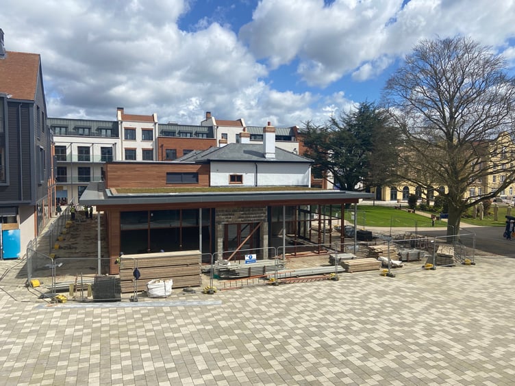 The scaffolding was removed from the Grade II-listed Brightwell House at the heart of the Brightwells Yard development in Farnham this week – revealing the building's new roof and extension. Once complete, it will accommodate a Coppa Club restaurant.