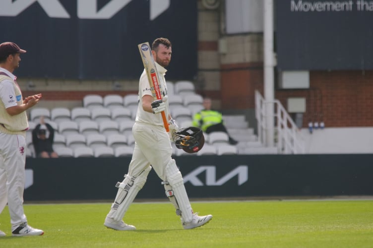 Dominic Sibley celebrating his century (Photo: Mark Sandom)