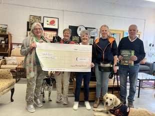Furniture shop donates £1,000 to assistance dogs charity