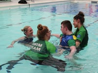 Swimming star visits Treloar's