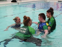 Swimming star visits Treloar's