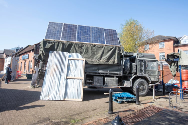 ALTON HAMPSHIRE: The centre of Alton in Hampshire is turned into an apocalyptic landscape (apparently to resemble Liverpool) for the filming of the Gerard Butler movie Greenland. Photograph By Chris Gorman / Big Ladder 7th May 2024.