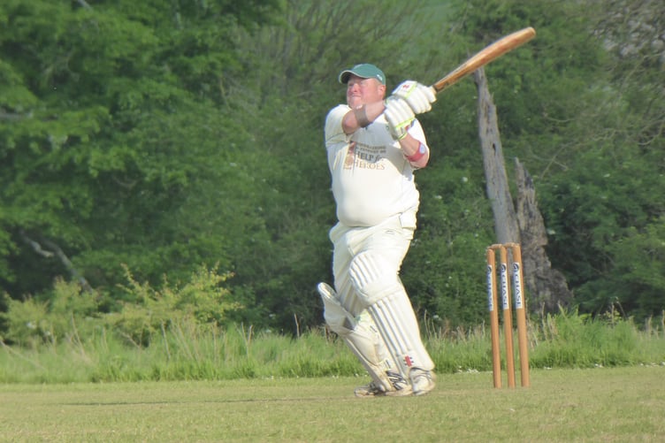 Waverley batter Simon Brewer in action