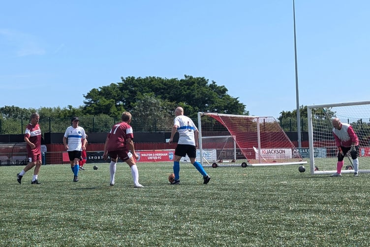 Action from Farnham Town Flares' 2-0 defeat against Godalming