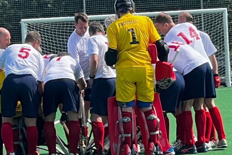 Ben Proudlove pictured in the England team huddle