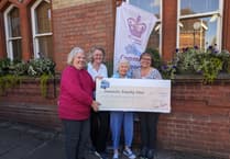 Dementia Friendly Alton gets £1,860 present from birthday girl and quizzers