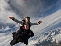 Great leap forward as volunteers skydive for canine charity